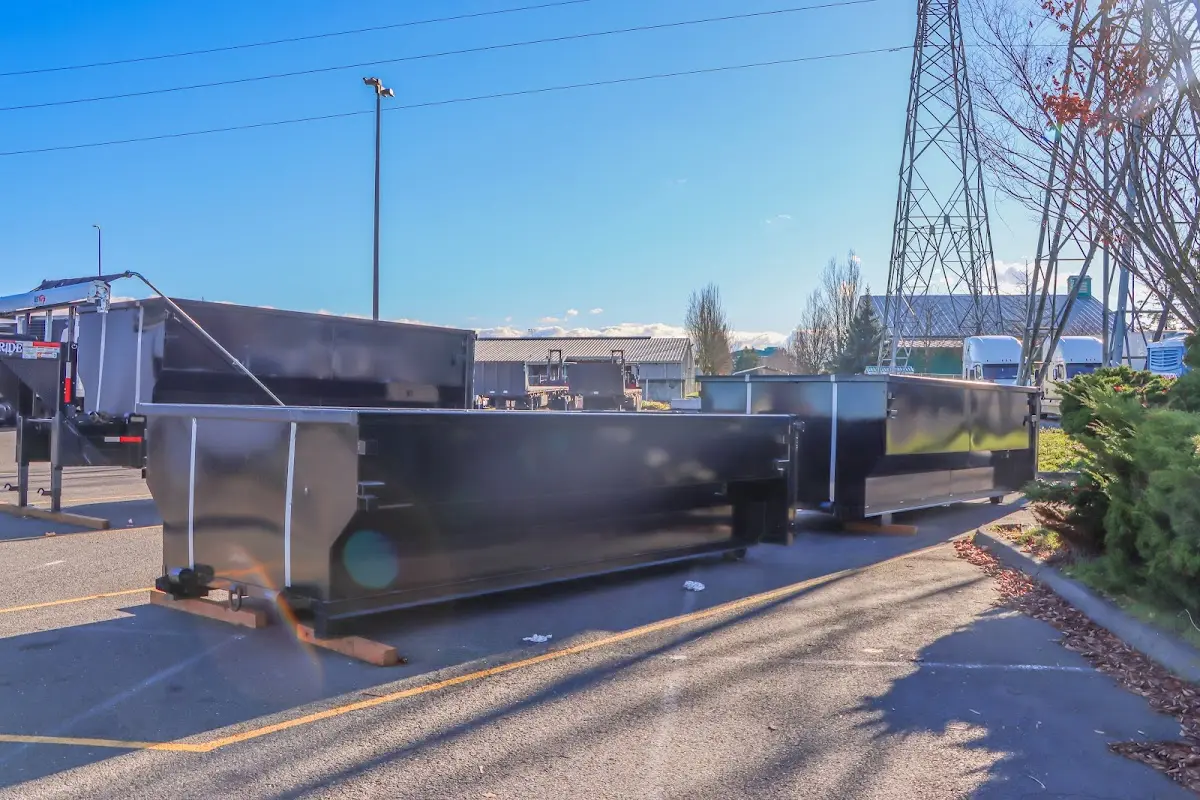 Roll-off dumpster ready for waste disposal at job site for 2 Yard Dumpster Rental in Deerfield